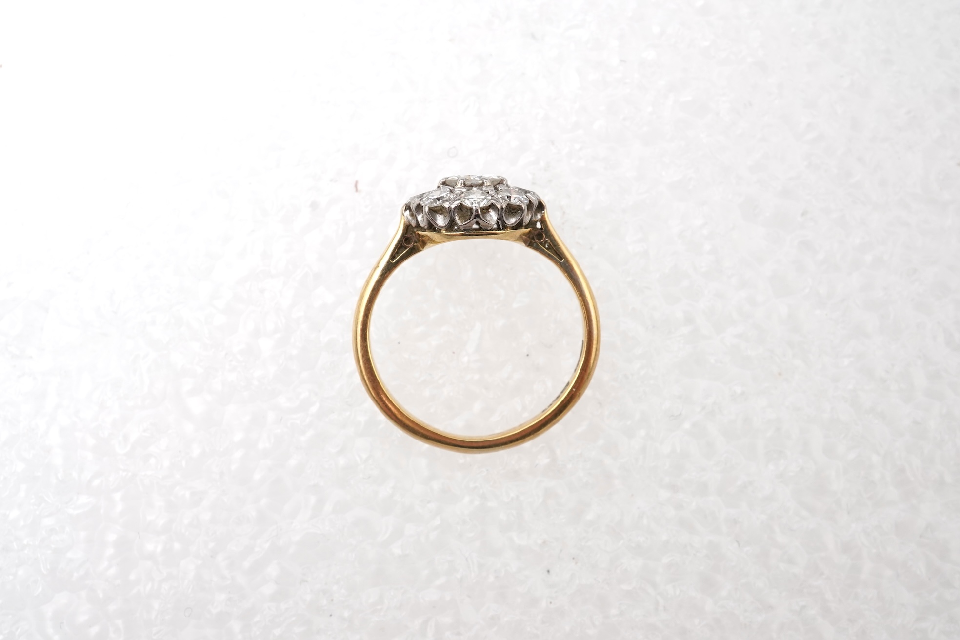 A diamond cluster ring